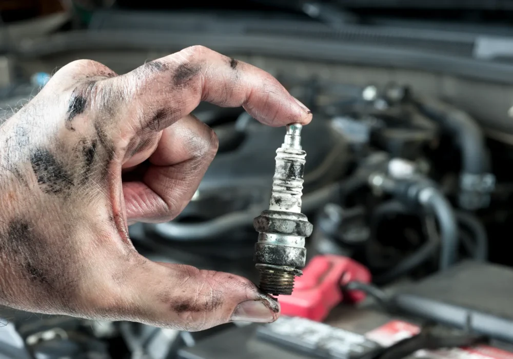 auto-mechanic-and-sparkplug-2023-11-27-05-21-32-utc